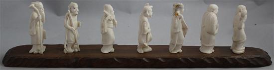 A set  of 7 Japanese ivory figures of the Gods of Happiness and an immortal